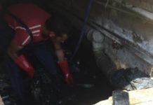 Égouts et ordures sous les immeubles dans le quartier גי d’Ashdod